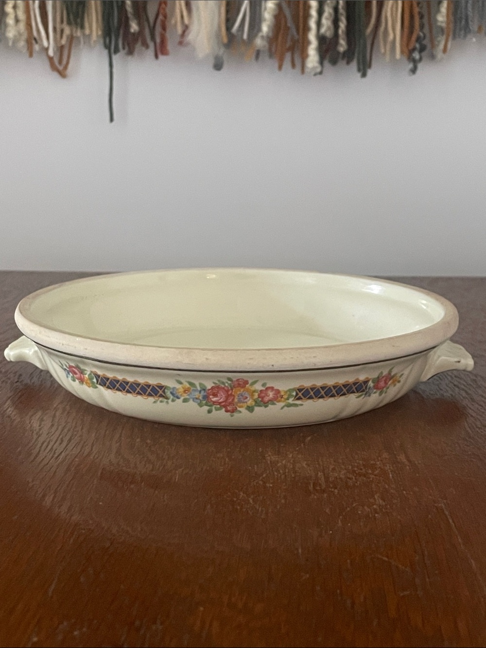 Antique crock small dish with floral pattern beige with blue bouquet pattern